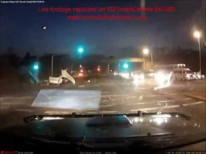 Truck runs red light and takes out several cars!