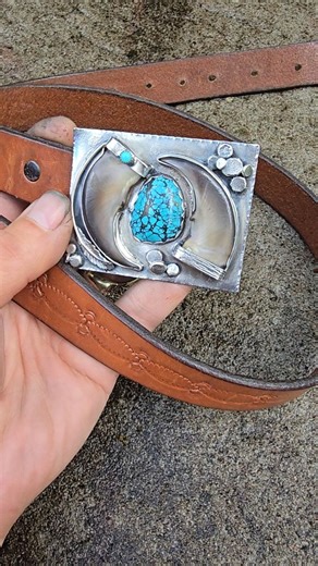 Did you know a traditional belt buckle can take longer to forge than an entire collection of rings? This one demanded that level of devotion—hand-built in sterling silver, shaped piece by piece, and finished with elements chosen for their power and presence. Black bear claws anchor the design with raw strength, while rich turquoise adds depth, contrast, and a sense of untamed terrain. Every edge is refined. Every form is intentional. Every detail guided by Emily’s eye and hand at the bench. Forg