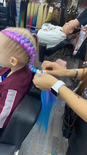 Creative Hair Braiding Techniques with Colorful Extensions
