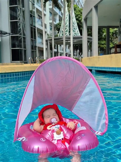 Baby's First Time Swimming in the Pool