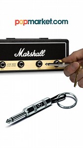 Upgrade your home setup with the ultimate key holder for music lovers! The Marshall JCM800 Jack Rack Version 2.0 brings authentic amp vibes to your space, featuring real amp materials, 4 Marshall guitar plug keychains, and all the mounting gear you need. Hang your keys like a rockstar!   Shop here: https://bit.ly/3V8ozgF | popmarket | Facebook