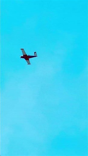 red and white airplane #outdoors #flying #sky