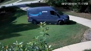 Surveillance video shows Amazon driver driving through front yard