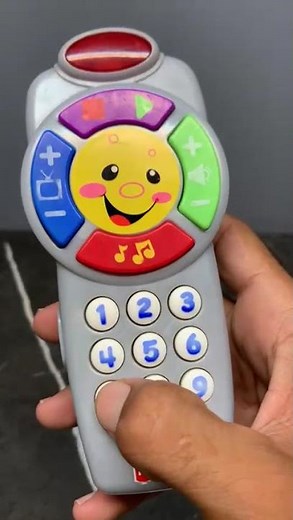 Fisher-Price Laugh & Learn Click 'n Learn Remote.