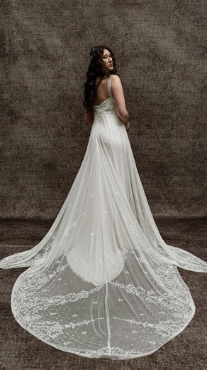 Saint Bridal Couture on Instagram: "Dreamy fitting moments with SIENA 🤎🕊️ This all-new Saint gown features intricate lacework inspired by age-old France, creating a silhouette that feels effortless yet unforgettable. With an empire neckline and enchanting train, the Siena gown is a must-try for the modern romantic bride. Elevate the look with the ethereal PROVENCE SLEEVES and the alluring MEDICI VEIL for a bridal moment that is truly out of this world. Would you say ‘I Do’ in the Siena gown? L