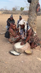 Himba women in Angola gather as a family to grind millet on traditional stones, chatting and laughing together. This everyday moment is also a space for bonding and cultural transmission, where ancestral stories and teachings are shared. #inspirationofafrica | Quim Fàbregas - Fotografía y Viajes.