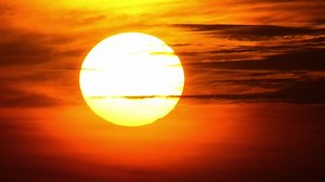 clip-1083411736-beautiful-golden-sunset-dark-clouds