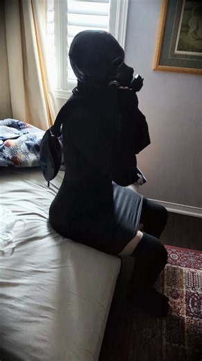 Unmasking from her horribly beautiful gasmask and stretching her rubber face... 😳#gasmask #doll #kigurumi #skinsuit #femalemask #skinwalker