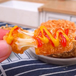 230K views · 3.9K reactions | Miniature Mozzarella Cheese Corn Dog Recipe | Teeny Cakes | Facebook