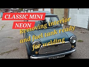 Classic mini Neon. Stripping the interior and fuel tank ready to repair the dreaded cover sills