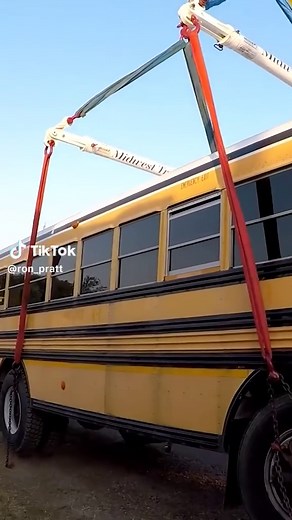 A Heavy School Bus Rescued by Tow Truck