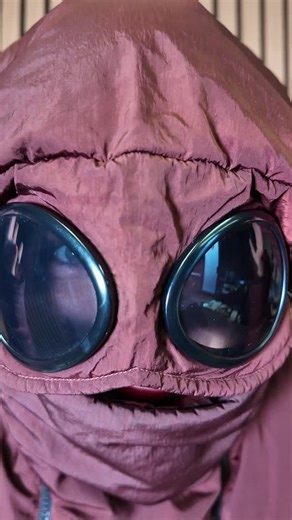 Heatfromthespire on Instagram: "C.P. Company BI-Mesh Down Jacket 🍷 Textured insulation — the BI-Mesh Down Jacket from C.P. Company in a rich burgundy shade. Constructed with a distinctive bi-mesh nylon outer that gives subtle structure and movement, the piece is fully down-filled for warmth and comfort. Featuring the signature goggle-hood detail, utilitarian dual-zip pockets and garment dye for tonal depth, it bridges C.P.’s heritage “goggle” aesthetic with modern winter function. ⚡️ #cp