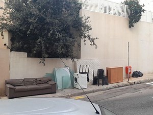 Why? But why? Unwanted furniture, washing machine left on pavement in St Julian’s - The Malta Independent