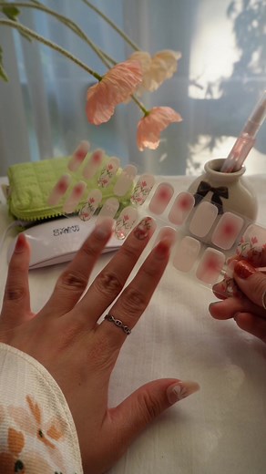 Florals, bows, pinks & aura nails all into one GEWEL gel nail sticker 🌷✨🪿💞 Our viral gewel uv gel nail wrap is like salon gel nails but in sticker form! Stick them on, cure them with a UV and you’ve got a DIY at home manicure that lasts up to 2-3 weeks. #gelnailsathome #nailtutorial #nails #asmrsounds #nailsoftiktok