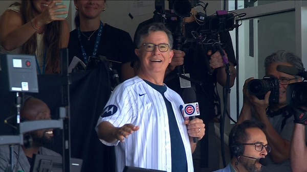 Stephen Colbert sings during 7th-inning stretch