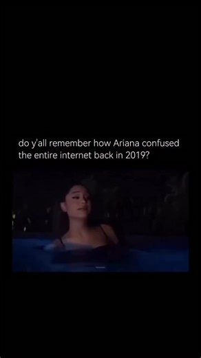 @thepurehistory on Instagram: "A moment in 2019 when Ariana Grande “confused the entire internet” regarding the music video for her song “God Is a Woman.” The confusion stemmed from a specific scene in the video where two versions of Grande appeared to be facing each other, creating an optical illusion that led many viewers to debate whether they were looking at one person or two, and whether the image was a reflection or a double. This visual ambiguity quickly became a widespread meme and topic
