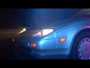 A car stuck in rain in a movie scene |Girl watches