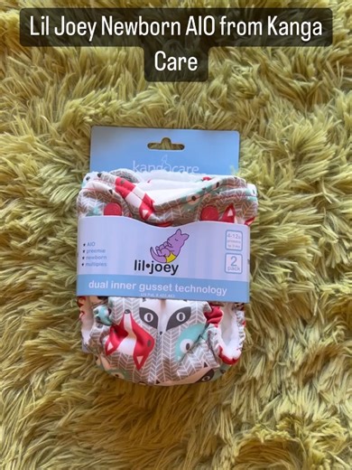 Newborn on the way? Newborn cloth diapers can save you so much money. These Lil Joey Newborn All-In-Ones from Kanga Care have a snap down in the front that clears the umbilical cord, a stay dry interior to keep baby feeling dry and comfy and the absorbency is built right in (no stuffing required). #newborn #clothdiapers #clothdiaperscanada #firsttimemoms #newbaby