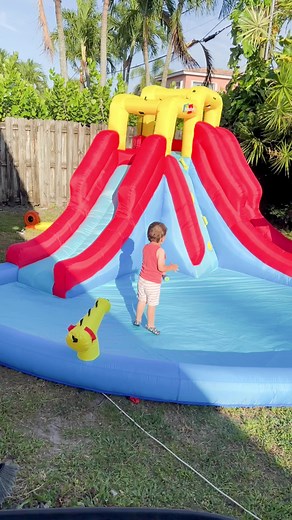 This inflatable water slide and bounce house provides a fantastic water park experience for kids. Enjoy double slides, a giant splash pool, a climbing wall, and double water cannons for endless fun! https://urlgeni.us/amzn/duyguakdnz #whubefy