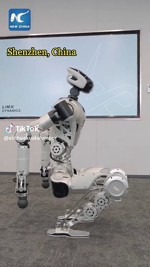 A full-size humanoid robot developed by a Chinese company demonstrates coordinated multi-joint movements, including lying on its back and face down, performing deep squats and twisting its waist. #China #humanoid #robot #technology