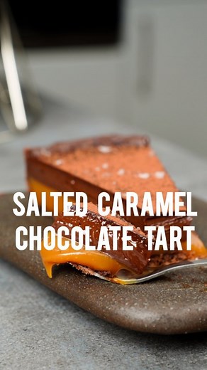 Salted Caramel and Chocolate Tart. It's decadent, it's creamy, and it's rich. We're making a flaky and buttery chocolate pastry, a salted caramel, and a chocolate ganache for this one. And it's so so so good. A chocolate tart is one of my staple desserts. It's been my go-to for SO many events and parties. But as a salted caramel fan (love sweet and salty) a layer of salted caramel unser the dark chocolate ganache had to be done. If you're not a fan of making your own pastry, you can totally just