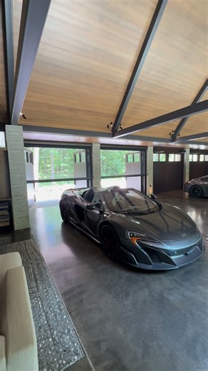 Tamarack Installations LLC | We’ve done some pretty exotic garages and mancaves before but this one was on another level. This customer in Milwaukee built an absolute... | Instagram