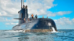 Rescue crews face false leads in search for missing submarine