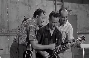 Bill Haley & His Comets - Goofin' Around (1956) "Goofin' Around" by Bill Haley & His Comets captures the lively spirit of rock 'n' roll's early days. Released in 1956 on the album "Rock 'n' Roll Stage Show," this track embodies the playful energy and dynamic rhythm that defined Haley's music and the emerging rock scene. The song's upbeat tempo is driven by swinging saxophones, sharp guitars, and an infectious beat. This synergy of instruments highlights the band's blend of rhythm and blues with 