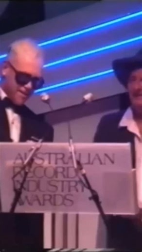When icons recognize icons 🤝 In 1987, Elton John presented INXS with the Best Australian Group at the very first ARIA awards. This year, INXS is nominated for a spot in the 2026 Rock & Roll Hall of Fame inductions. Drop a 🎸 if you’ve voted!#RockHall2026 https://vote.rockhall.com/ | INXS