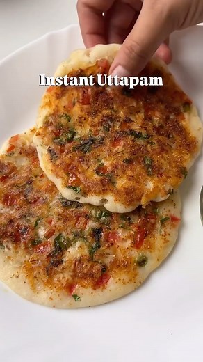 Harshita Sharma on Instagram: "Easy breakfast recipe 📌 Save for later Ingredients • Rava (suji) • Curd • Salt • Water • Baking soda • Veggies (tomato, onion, green chilli, coriander leaves) • Sambar masala • Oil Follow for more (Uttapam recipe, instant uttapam, rava uttapam, South Indian food, breakfast recipe, easy recipe, quick recipe, tiffin ideas, kids lunch box) #ravauttapam #uttapam #southindiancuisine #viralreels #explorepage #instaviral #viralvideos #foryou #instadaily #instagrowth #exp