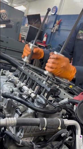 1.5 Chevy engine injectors removal with special tools.