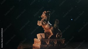 Figurine of a Roman chariot in a ray of light