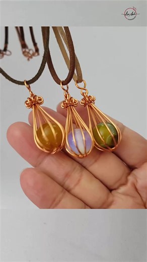 Lan Anh Handmade on Instagram: "Wire wrapped stone without holes | Water drop cage pendant #shortsvideo #wireworks #diy #handmade"
