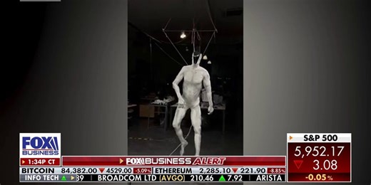 Clone unveils lifelike robot to do household chores