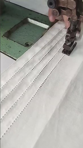 Fine aligned loop embroidery.