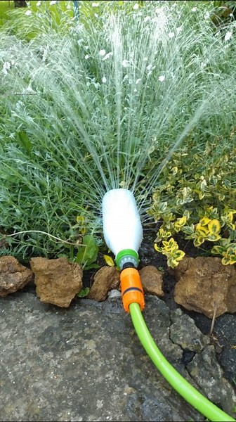 Homemade Hose Nozzle made from a Plastic Bottle. This is the only way i water my garden now #diy