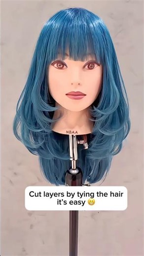 Cutting layers by tying the hair, it’s actually easy 😁 #layerup #haircuttutorial