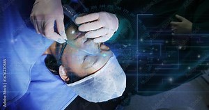 Surgeon aligning anesthesia mask to patient face, sealing for anesthesia via transparent interface Stock Video