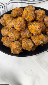 These sausage balls are super easy to make and we always have them on Christmas morning. I make them the night before and pop them in the oven in the morning . Here are the ingredients. 1 lb Breakfast sausage Jimmy Dean 1 1/2 cups Bisquick Baking mix 2 cups shredded cheddar cheese 1 Teaspoon garlic powder 1 Teaspoon onion powder 1/2 Teaspoon Black pepper see notes 1 Teaspoon Hot Sauce 1 Teaspoon Worcestershire 1/2 cup milk | Baked Broiled and Basted