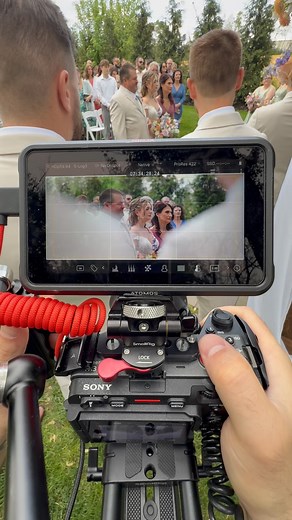 Sometimes an object (or people) in the foreground can be used to easily frame up your subject. #Wedding #weddingvideography #weddinginspo #weddinginspiration #weddingideas #weddingphotography | Peter Magazzu - Professional Videographery