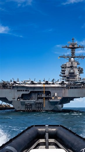 Why is the USS Gerald R. Ford in Florida? A rare sight near the coast. This floating city is usually deep at sea. Is this a pit stop or a strategic repositioning? The view from behind shows its massive scale. 🇺🇸 . . #military #usa #ussgeraldrford #cvn78 #florida #usnavy #supercarrier #navalwarfare #mayport | Military Aviation