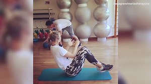 Maria Sharapova trains in the gym with gruelling medicine ball workout
