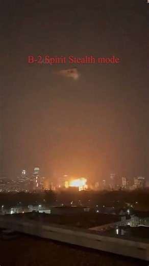 A B-2 Spirit is shown releasing a guided payload