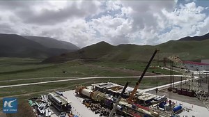 Two giant tunneling machines will be used to construct the longest freeway tunnel in Xinjiang, NW China, after a new power transmission line is put into operation | China Xinhua Sci-Tech
