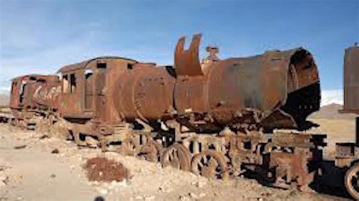 Bolivia's Train Cemetery — A Hauntingly Beautiful Journey 🌵🇧🇴 Just outside the remote town of Uyuni, on the edge of the world’s largest salt flat, lies one of the most surreal places on Earth — El Cementerio de Trenes, Bolivia’s legendary Train Cemetery. Here, rusting steam locomotives sit frozen in time, their boilers cracked, wheels half-buried in the sand, and metal frames slowly being claimed by the desert. Once destined to connect Bolivia to the Pacific coast, these engines were abandone