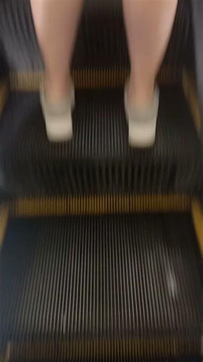 otis xo 508 at uniqlo kuala lumpur pavillion malaysia mall single file narrow red handrail 2025