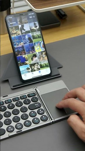 The portable folding keyboard comes with a stand and touchpad,can be used with Bluetooth connection
