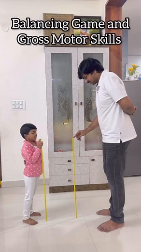 “Ready, set, go! One should release the stick and moves clockwise to the next one. The objective is to keep all the sticks upright through multiple rounds. After completing 5-6 rotations, increase the difficulty by stepping further away from the next stick. This adds an exciting challenge. This activity is not only fun but also excellent for developing balance, teamwork, and gross motor skills!”Did you like the game??#indooractivities #braindevelopment #earlylearning #playtolearn #parentingtips 