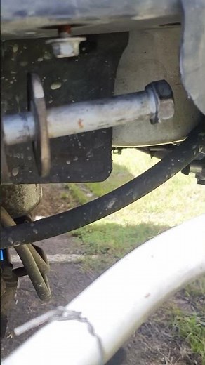 How to remove control arm bolt