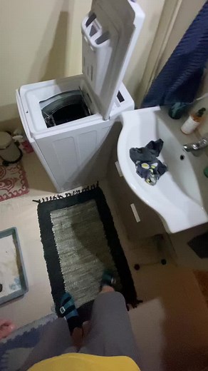 Exploring a White Front-Loading Washing Machine